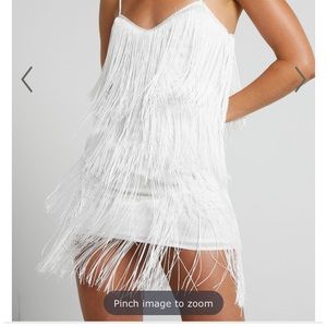 Showpo. SIOFRA MINI DRESS - ZIG ZAG FRINGE DRESS